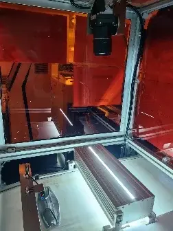 Fixed-position camera inside the mask inspection enclosure